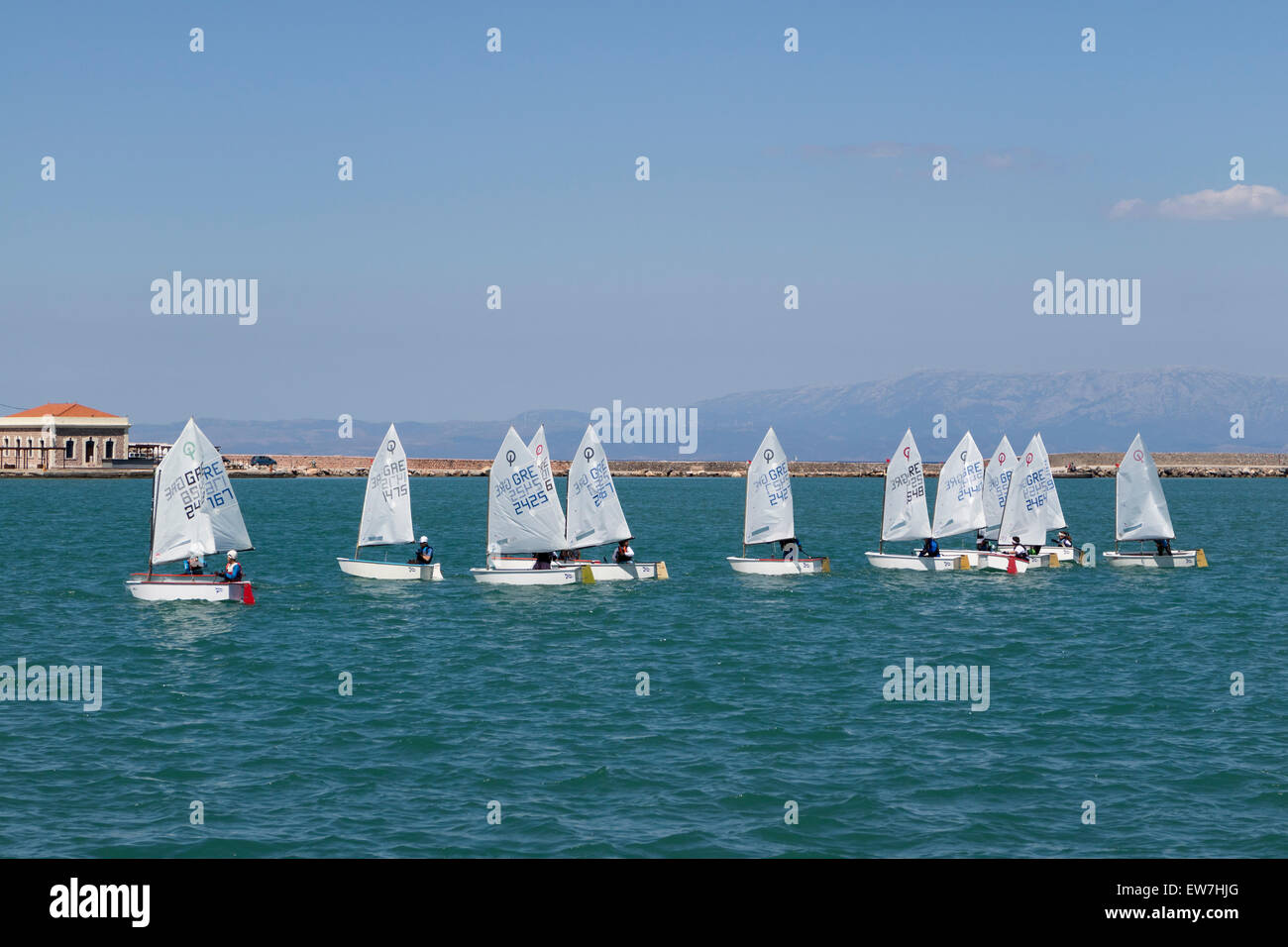 Sailing lessons for children in the bay of the city of Chios, on the isle of Chios, Greece Stock Photo