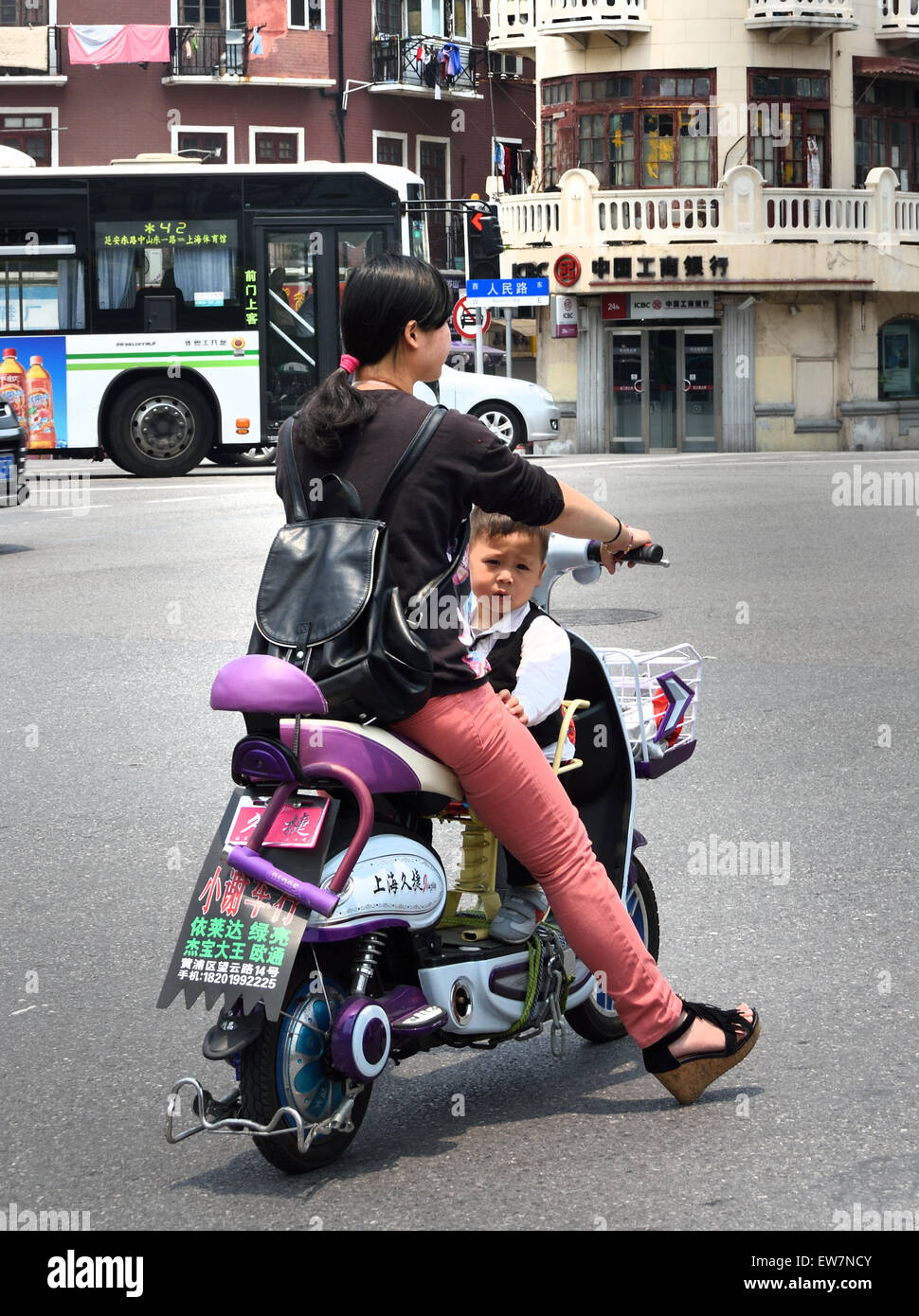 Mother with little boy on scooter Old Shanghai t The French Concession Luwan and Xuhui District China Stock Photo