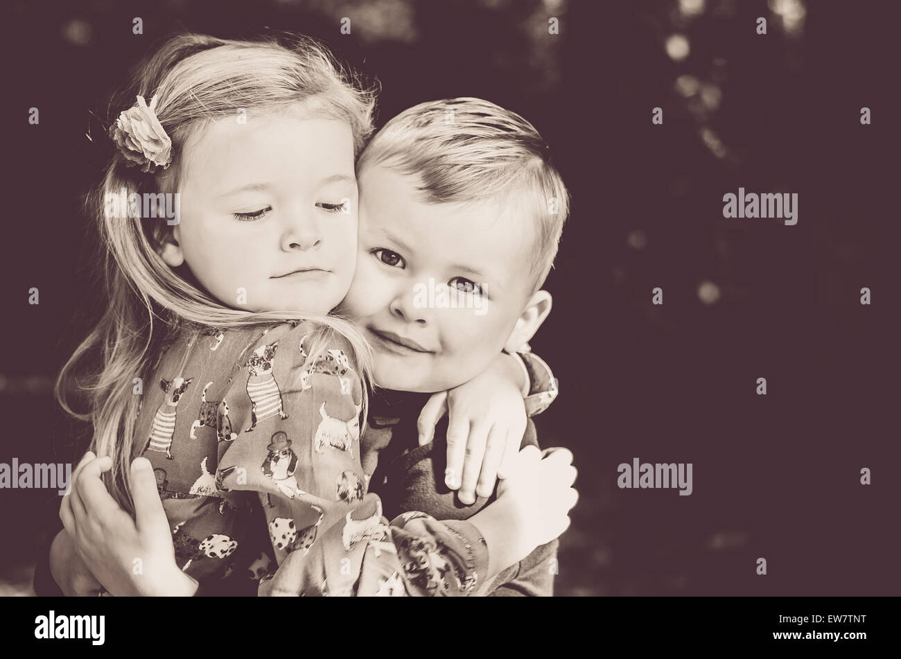 Girl and boy hugging Stock Photo