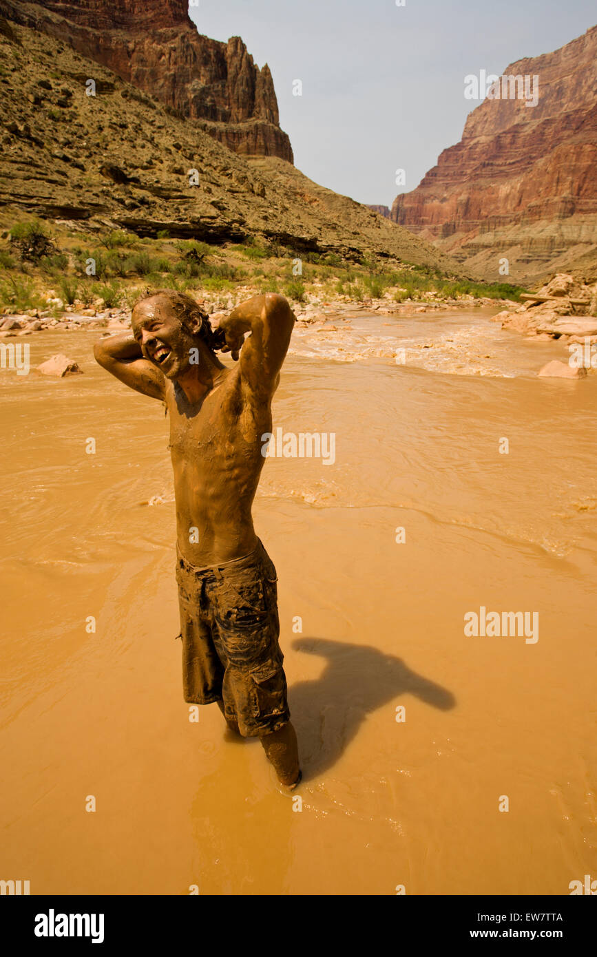 People playing/covered in mud. Stock Photo