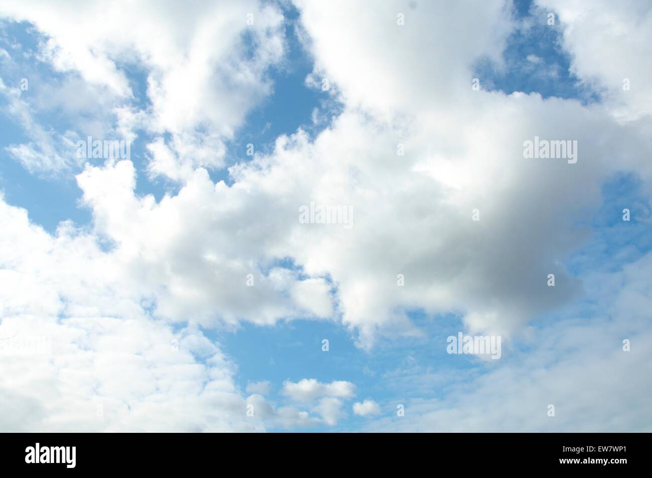 Pale fluffy clouds hi-res stock photography and images - Alamy