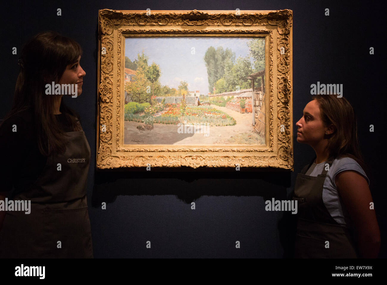 London, UK. 19 June 2015. Pictured: Le potager by Alfred Sisley, estimate: GBP 1.5-2 million, unseen in public for over half a century. Auction house Christie's unveils 52 Impressionist & Modern Art works which will be sold in Christie's Impressionist & Modern Art Evening Sale on 23 June, starting a week of sales at Christie's King Street and South Kensington (23-26 June 2015). Credit:  bas/Alamy Live News Stock Photo