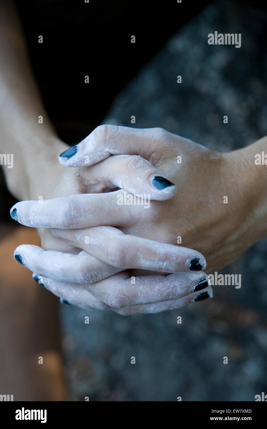 A climber's black manicure appears slightly worse for wear after a bouldering session at Indian Rock in Berkeley, California. Stock Photo
