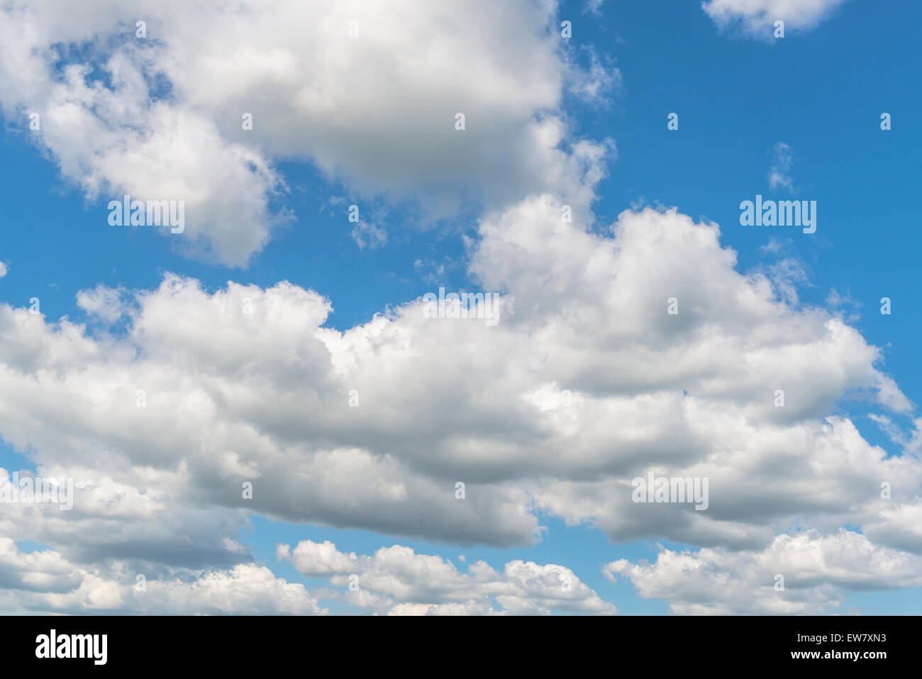 Blue sky with clouds - background and texture Stock Photo - Alamy