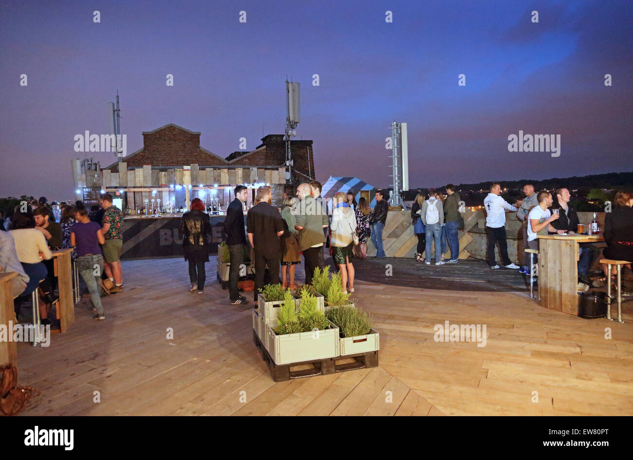 Rooftop bar on Peckham's famous Bussey Building - a Victorian factory building now home to alternative music and arts Stock Photo