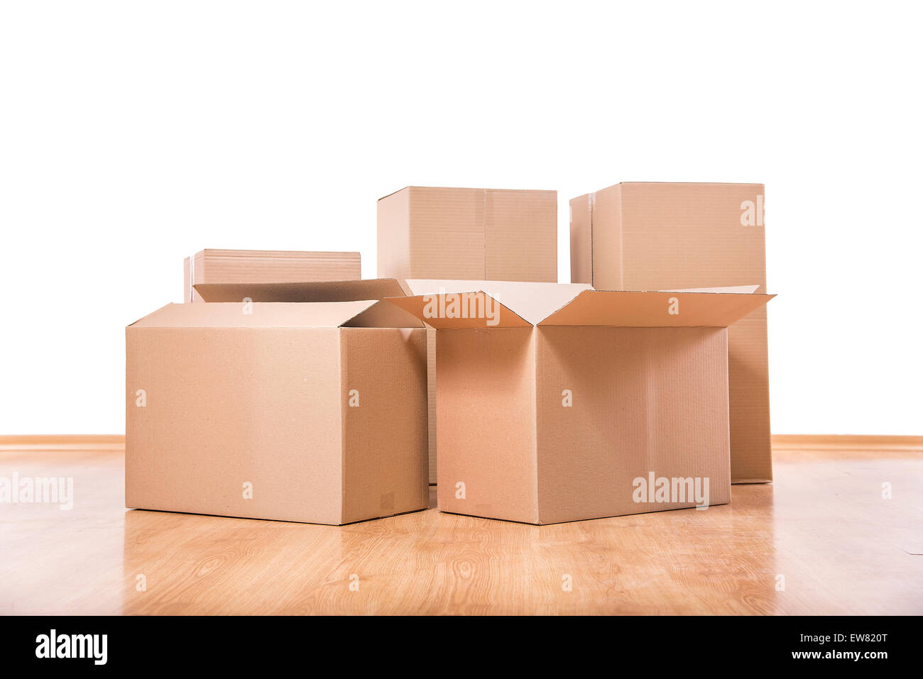 Moving boxes on the floor Stock Photo Alamy