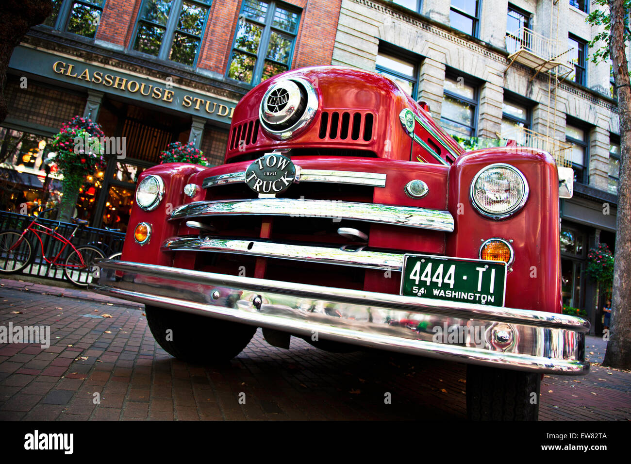 A vintage City of Seattle fire department tow truck in Occidental Park during Fire Festival. Stock Photo