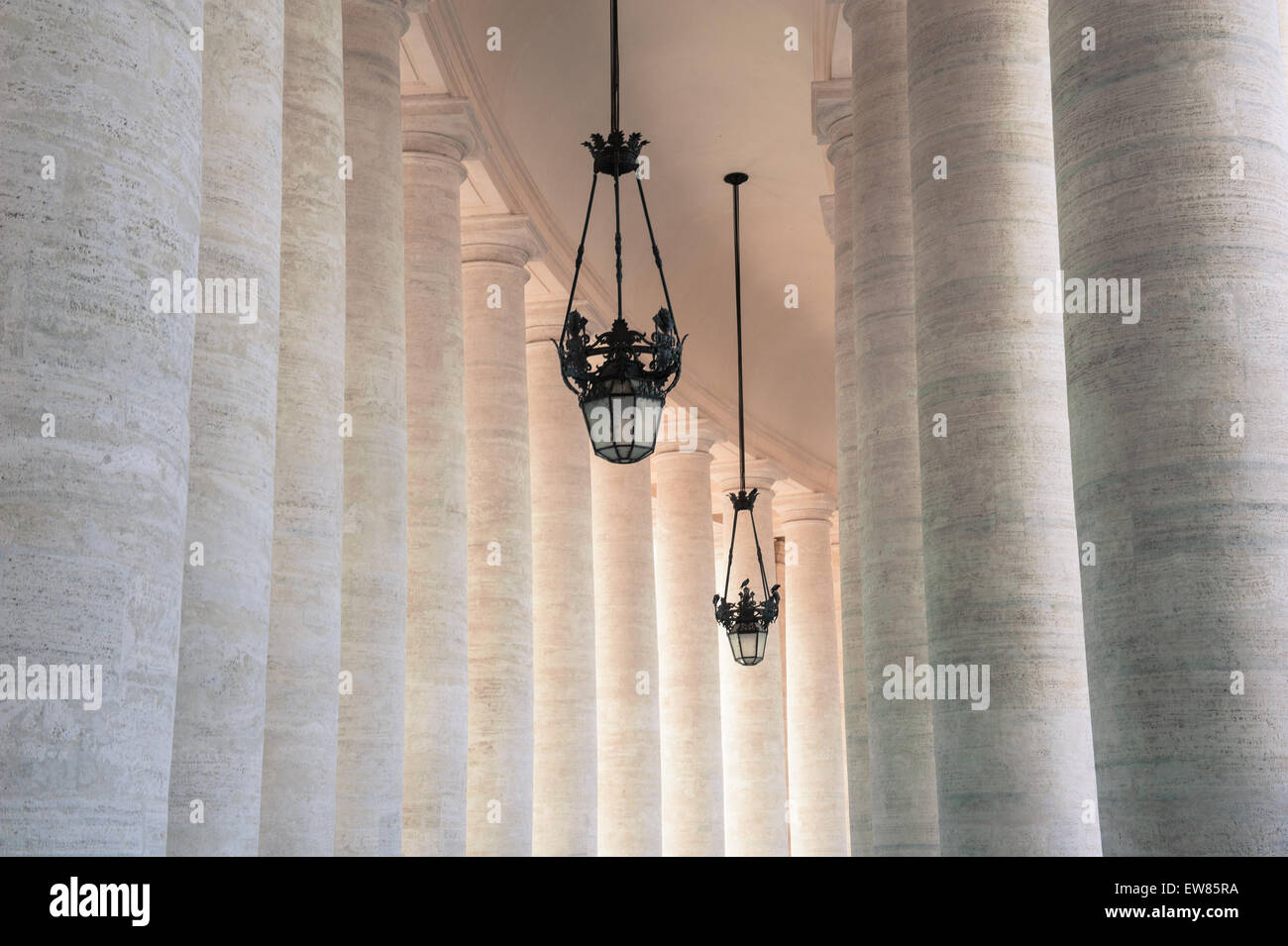 View inside Bernini's colonnade around St Peter square in Rome Stock Photo