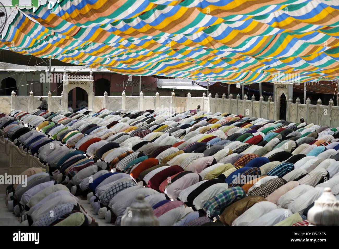 Muslims offer prayers on the occasion of first Friday of  Ramadan in Shrine of  Sufi saint Moinuddin Chishti. Ramadan is the ninth month of the Islamic calendar, and the month in which the Quran was revealed. Fasting during the month of Ramadan is one of the Five Pillars of Islam. (Photo by Anand Sharma / Pacific Press) Stock Photo