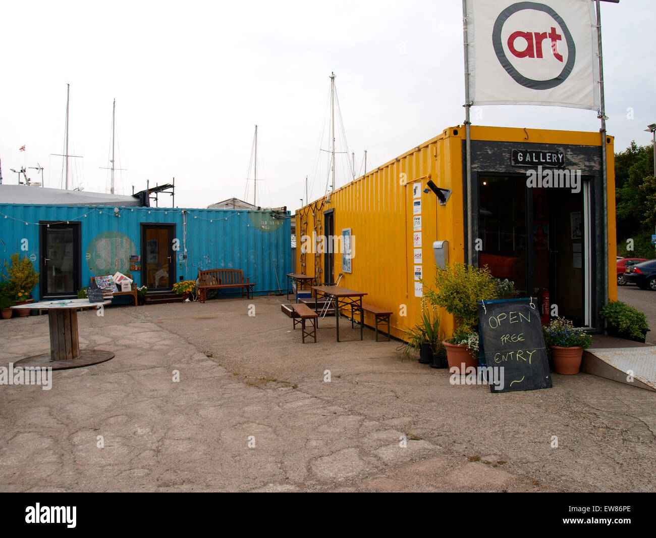 Contains Art is 3 shipping containers providing artists' studios and gallery space at Watchet Harbour, Somerset, UK Stock Photo