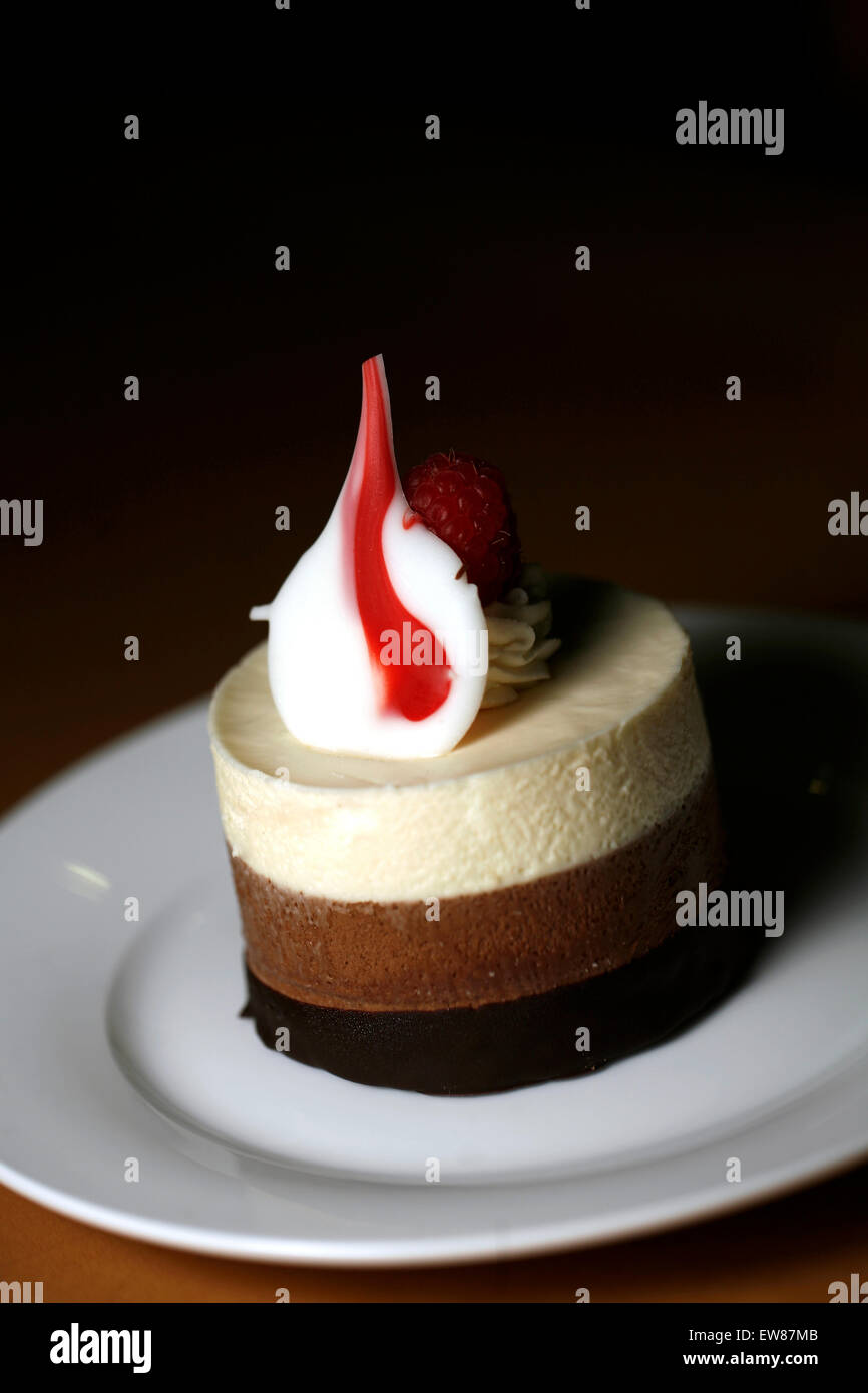 Triple Chocolate Mousse with Strawberry Garnish Stock Photo Alamy