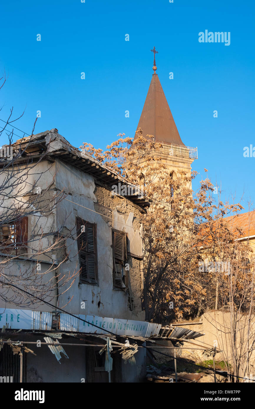 Derelict Coffee shop and Holy Cross Catholic Church on Green Line