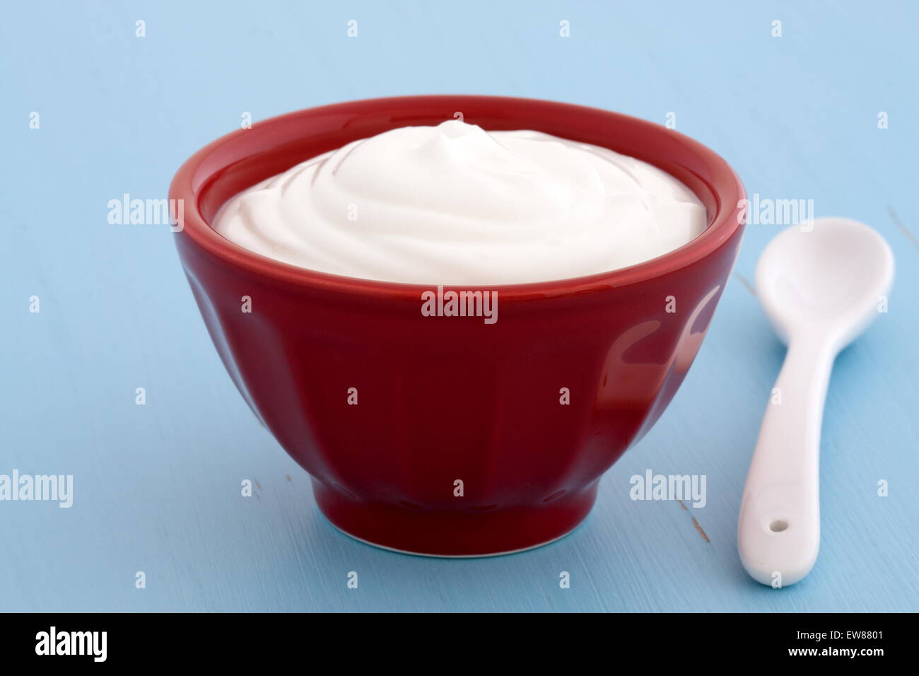 Delicious, nutritious and healthy fresh plain greek yogurt on antique