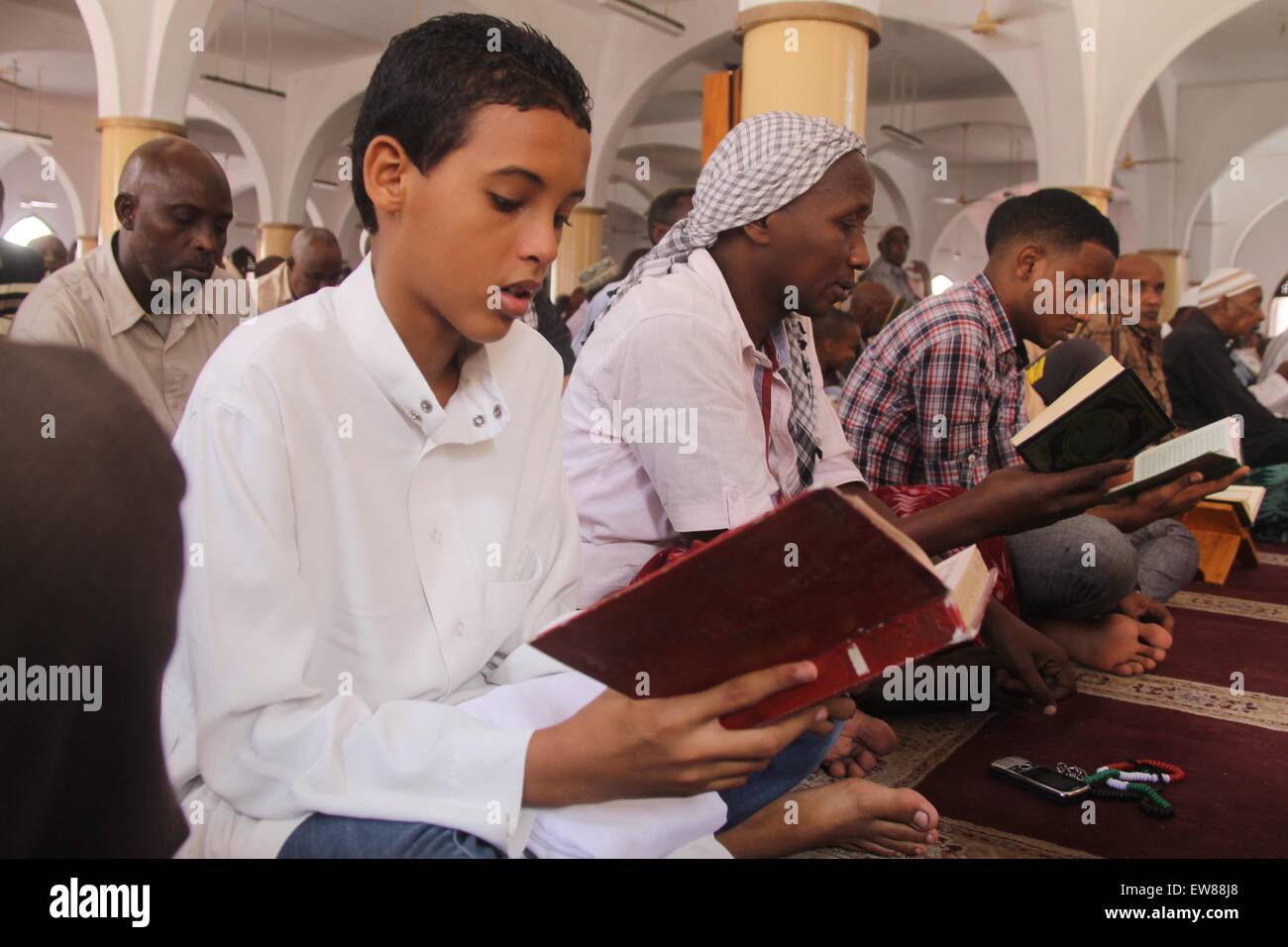 Mogadishu. 19th June, 2015. Somali people pray at a mosque on the first Friday of the holy month of Ramadan in Mogadishu, Somalia, June 19 2015. Credit:  Faisal Isse Hussein/Xinhua/Alamy Live News Stock Photo