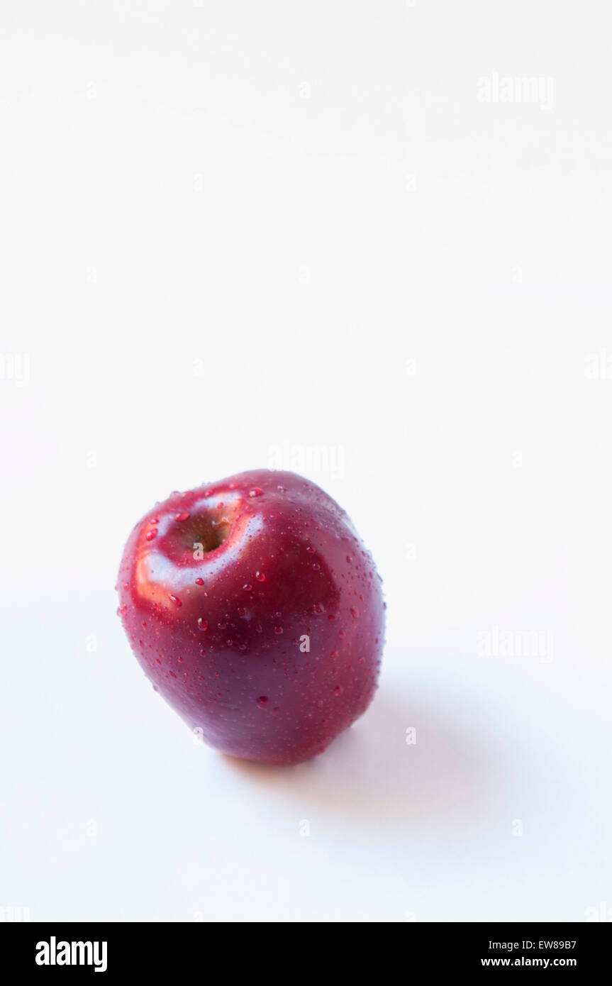 Whole Red Apple on White background Stock Photo - Alamy