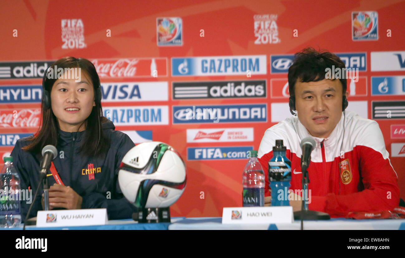 Edmonton Canada. 19th June, 2015. China's coach Hao Wei (R) and player ...