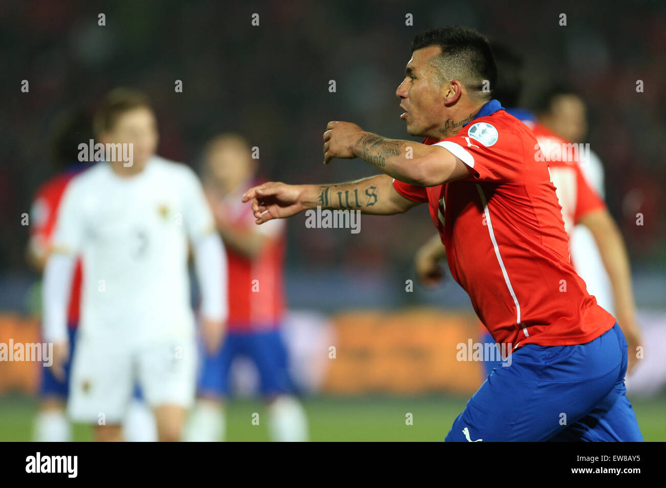 Santiago, Chile. 19th June, 2015. Chile's Gary Medel celebrates his score during the Group A match of the Copa America Chile 2015, against Bolivia, held in the National Stadium, in Santiago, Chile, on June 19, 2015. Chile won 5-0. Credit:  Jorge Villegas/Xinhua/Alamy Live News Stock Photo