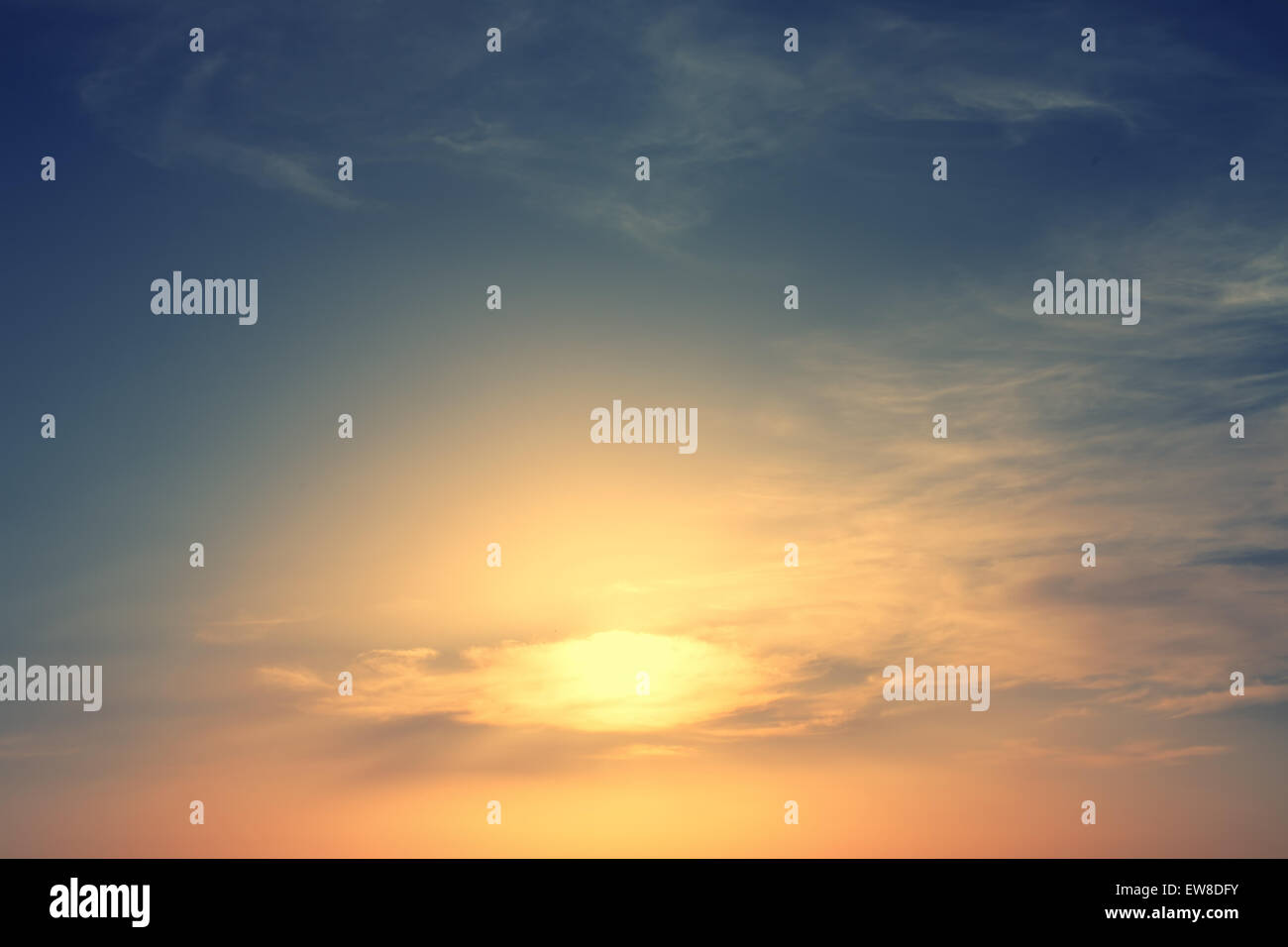 Summer sunset sky with clouds and sun Stock Photo - Alamy