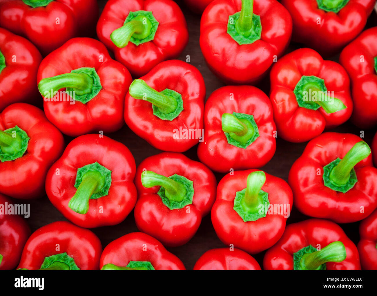 Red peppers on a market stall Stock Photo - Alamy