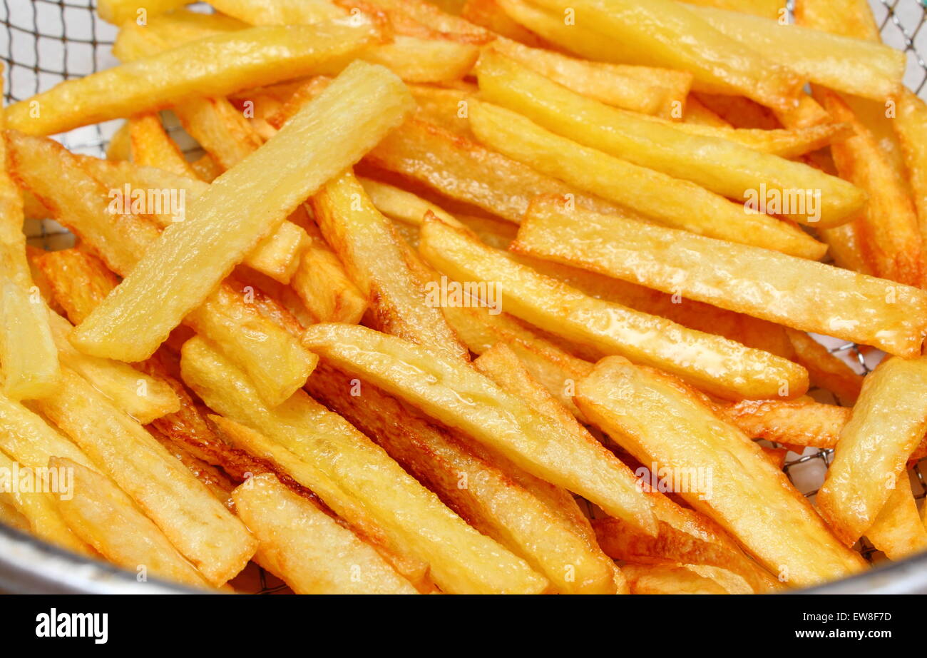 Heap of french fries fried in oil, deep fried, unhealthy Stock Photo Alamy