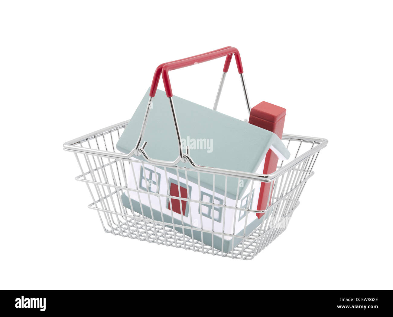 Shopping basket with house miniature isolated on white background Stock Photo