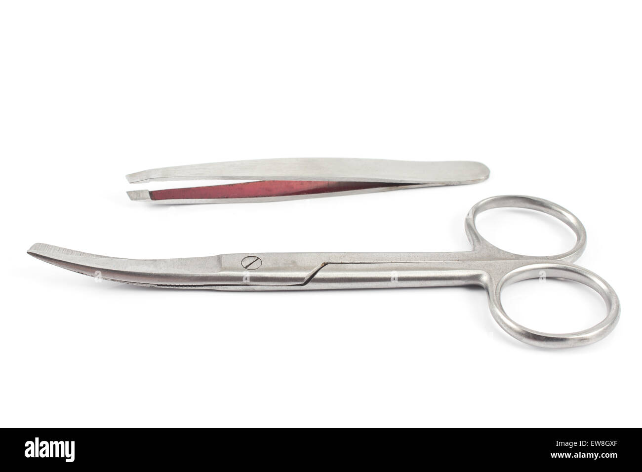 Nail scissors with  eyebrow tweezers isolated on  white Stock Photo