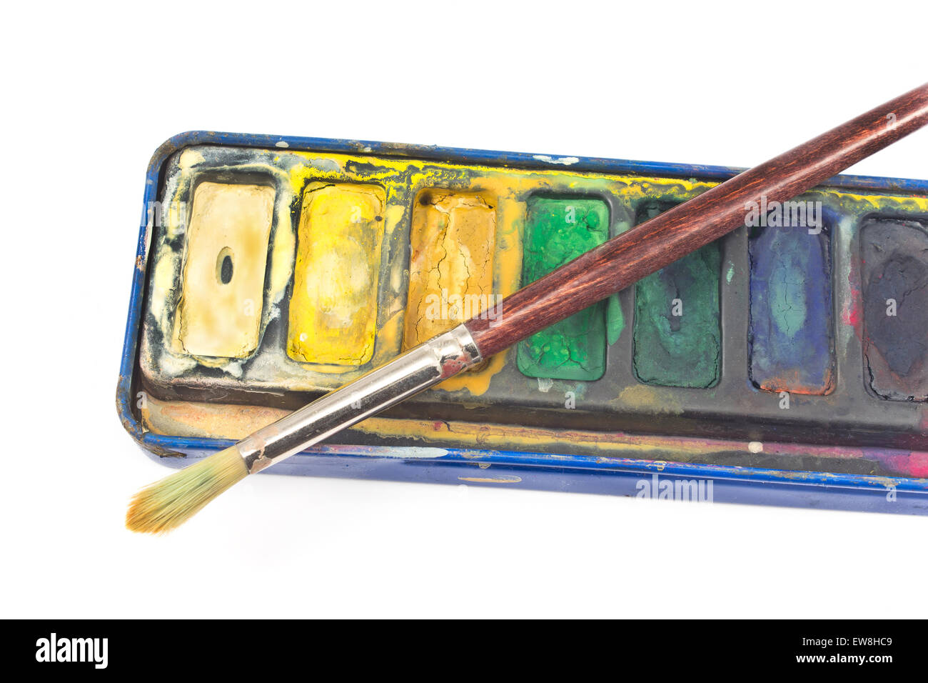 Closeup of Watercolor paints and paintbrush on white Stock Photo