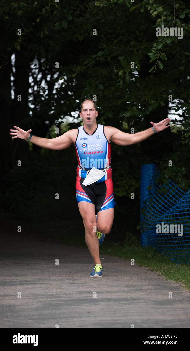 Rutland Water, Leicestershire. 20th June, 2015. Member of the RAF team displays a triumphant stance at the  Dambuster Triathon event. Credit:  miscellany/Alamy Live News Stock Photo