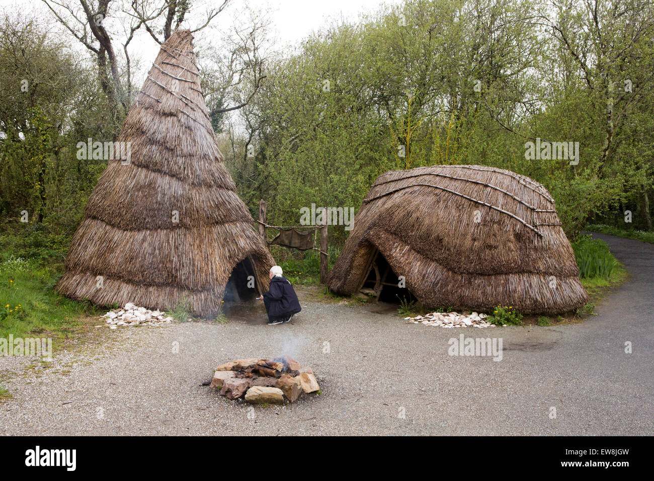 Ireland, Co Wexford, Irish National Heritage Park, tourist in middle stone age campsite Stock Photo