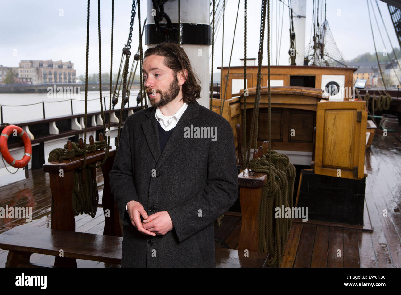 Ireland, Co Wexford, New Ross, tour guide on deck of replica 1845 emigrant ship Dunbrody Stock Photo
