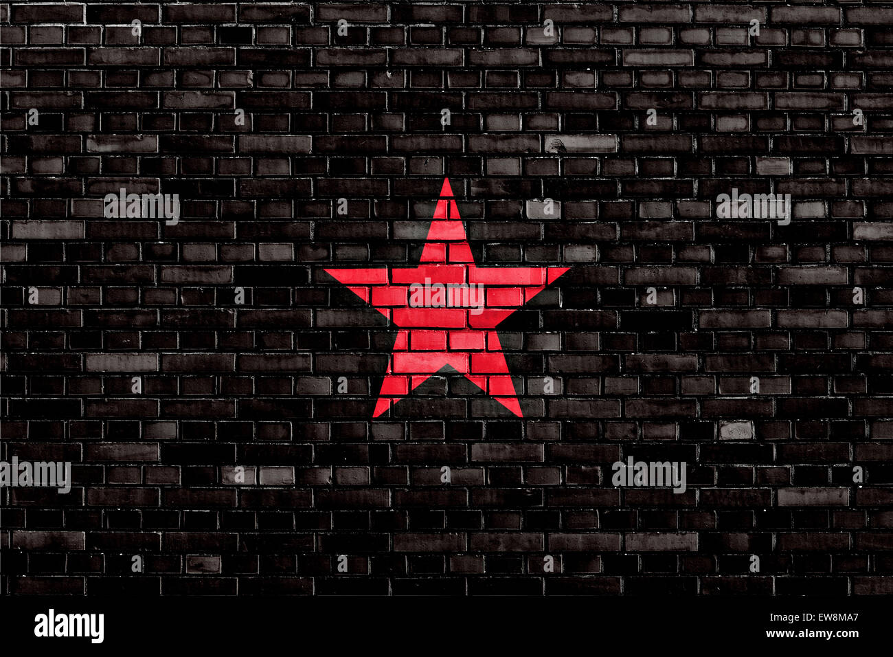 flag of EZLN painted on brick wall Stock Photo