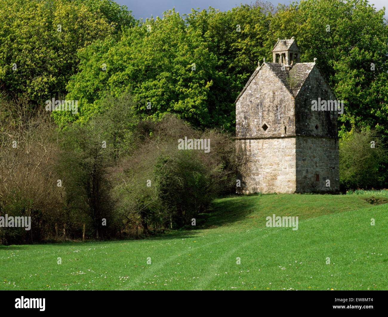 Parciau dovecote (c 1610), Anglesey, has room for 150 nests in its upper storey columbarium, birds enter through a stone lantern Stock Photo