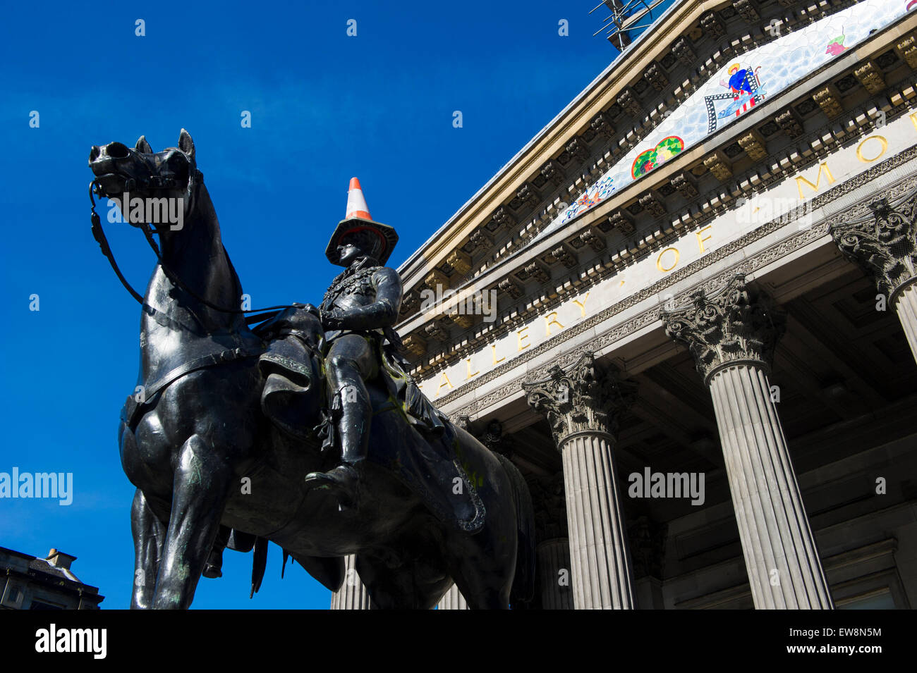 Statue of Duke of Wellington with traffic cones outside Museum of