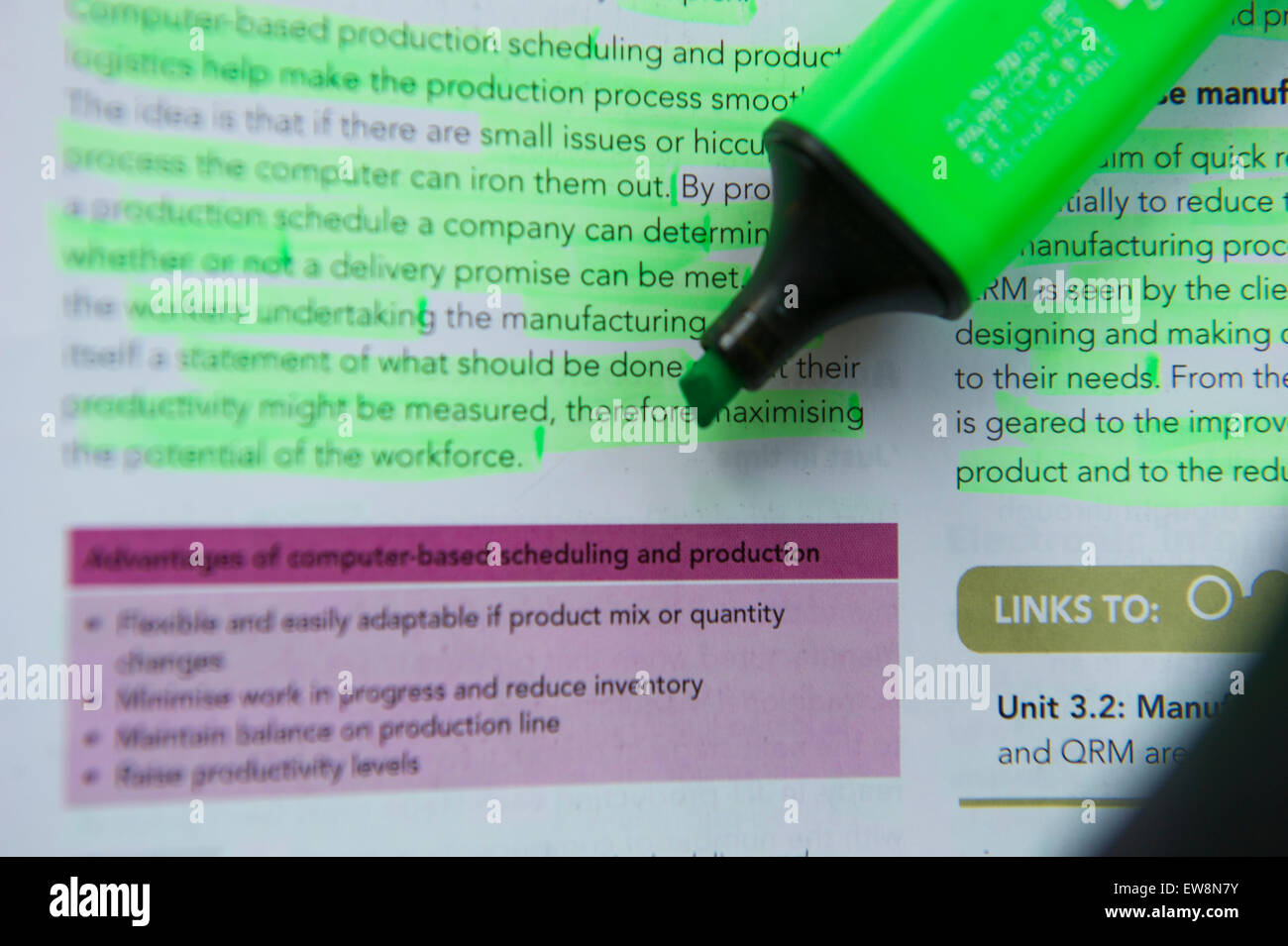 Highlighter pens on A level homework and revision Stock Photo Alamy