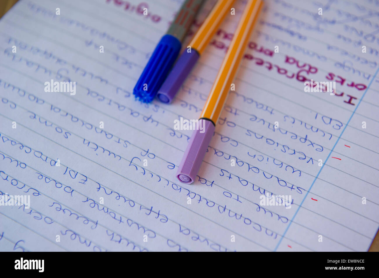 Highlighter pens on A level homework and revision Stock Photo