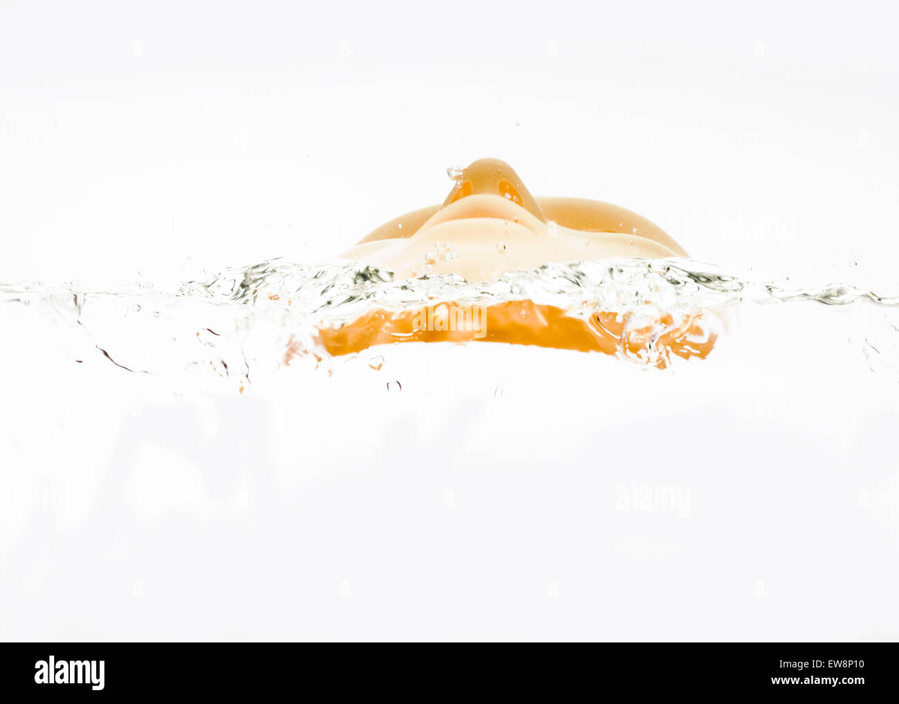 HUMAN FACE MASK IN WATER Stock Photo