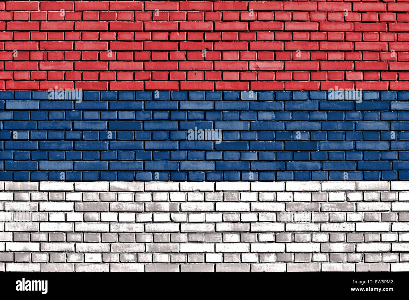 flag of Serbia painted on brick wall Stock Photo
