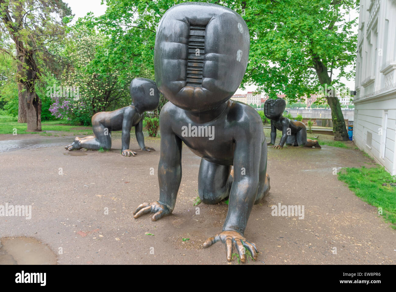 Czech art Cerny, view of a group of sculptures of faceless children by David Cerny sited next to the Museum Kampa in Prague, Czech Republic. Stock Photo