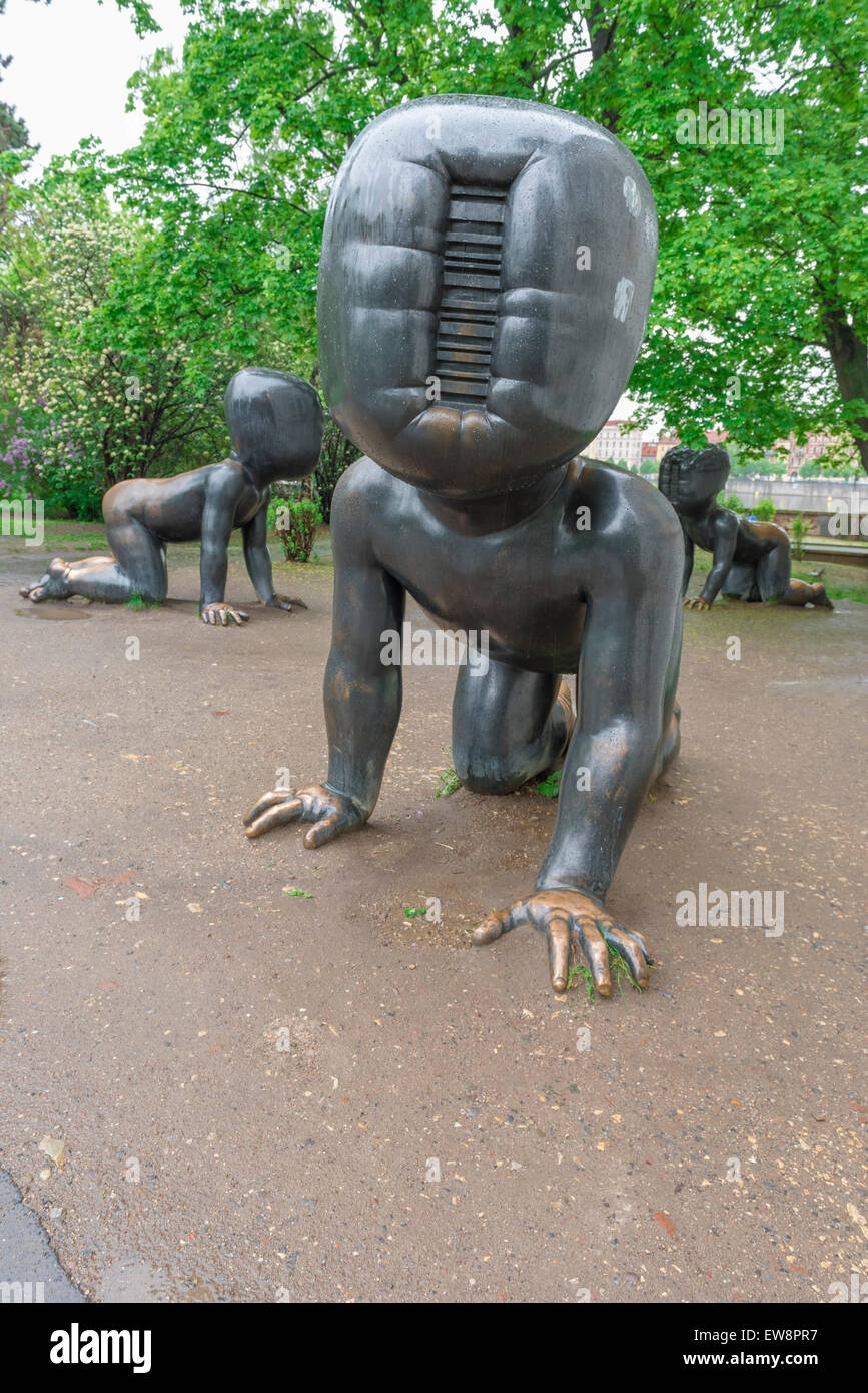 Prague street art, view of sculptures of sinister faceless children by David Cerny in the grounds of the Museum Kampa in Prague, Czech Republic. Stock Photo