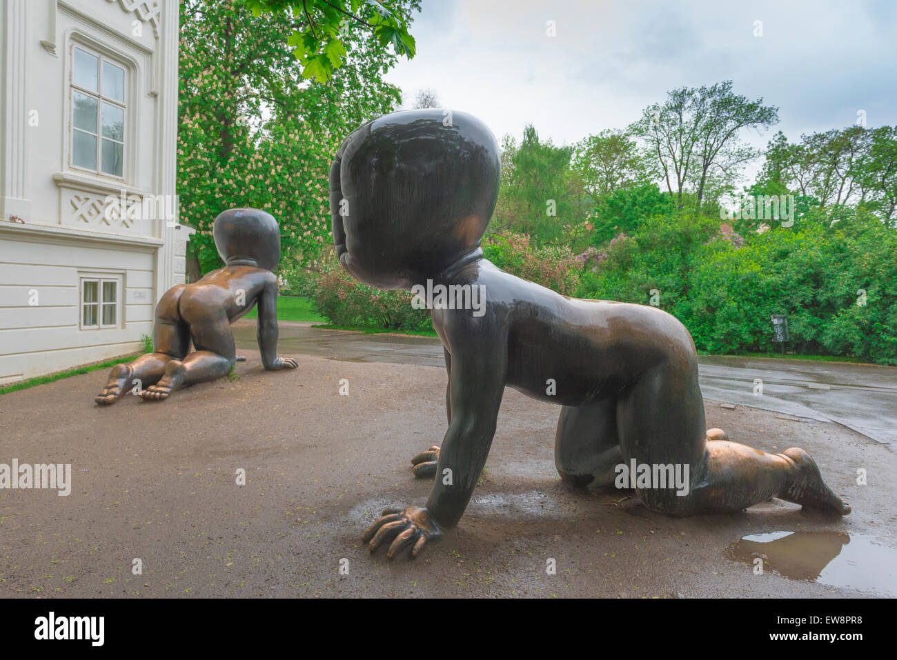 Cerny Prague, view of sculptures of sinister faceless children by David Cerny in the grounds of the Museum Kampa in Prague, Czech Republic. Stock Photo