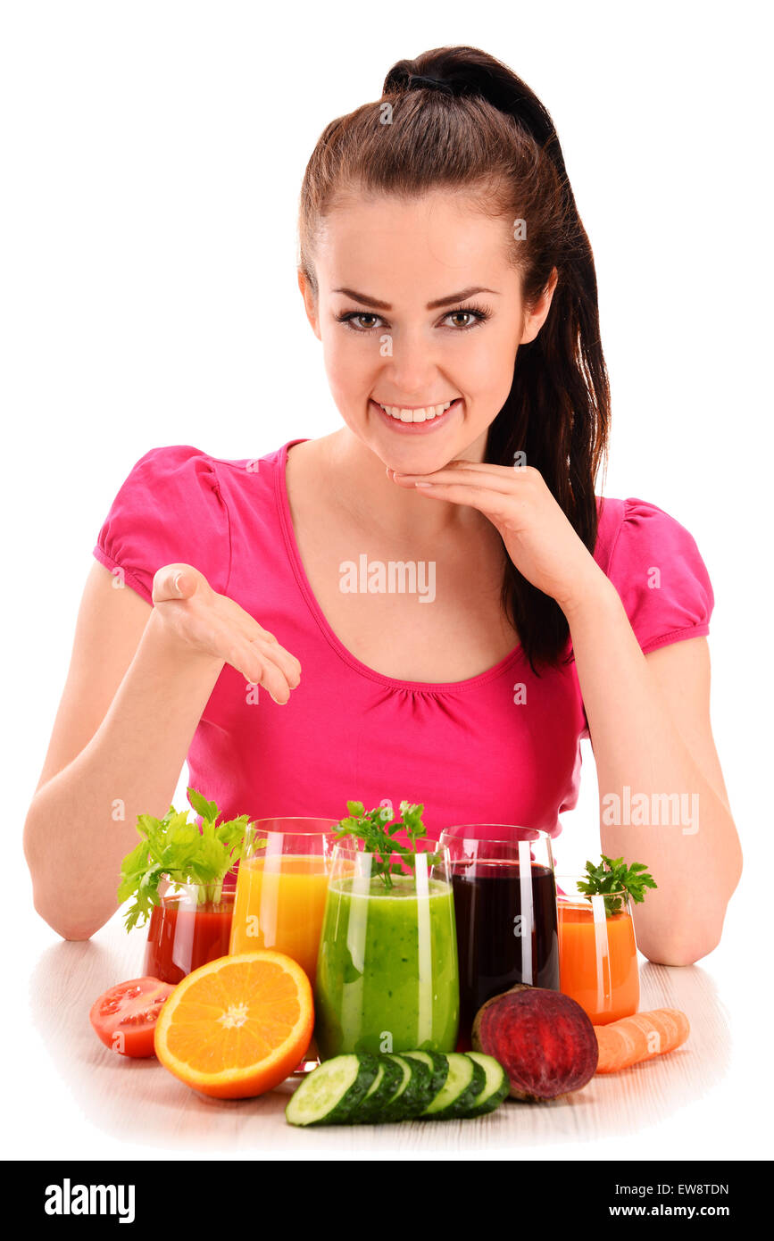 Young woman with variety of vegetable and fruit juices. Detox diet. Stock Photo