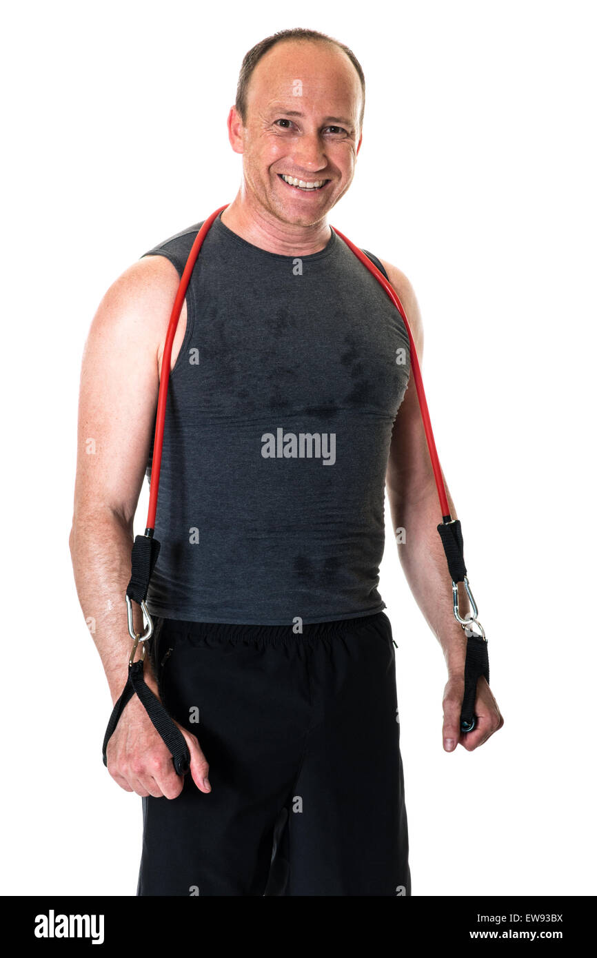 Adult man with a resistance band. Studio shot over white. Stock Photo