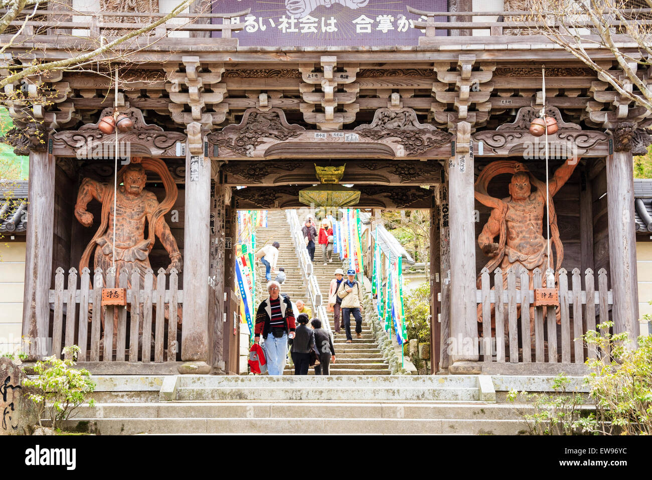 Japan, Miyajima, Daishoin temple. Close up of the Niomon Gate with a pair of guardian Nio King