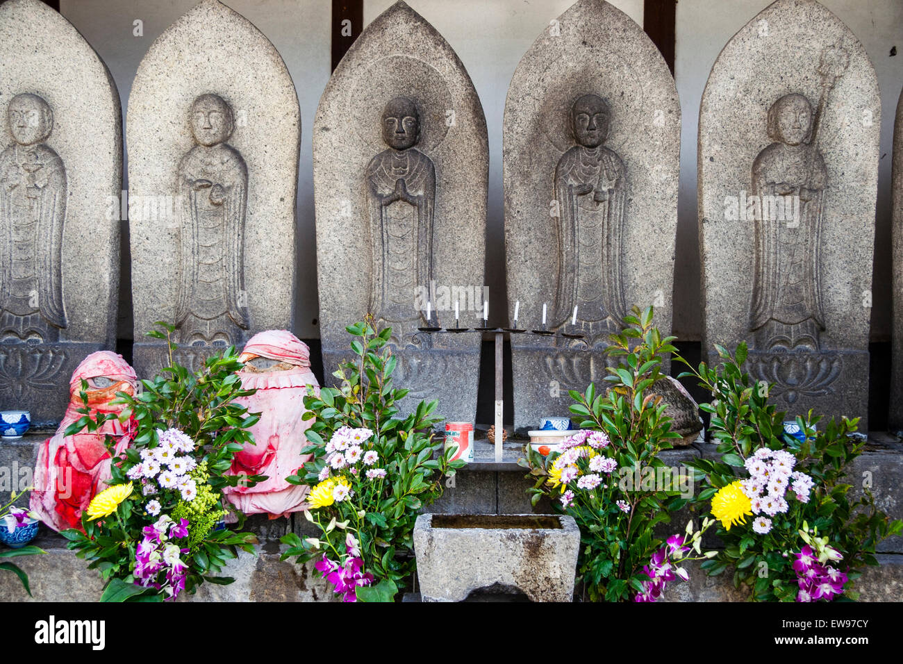Jizo bosatsu statues with red bibs hires stock photography and images