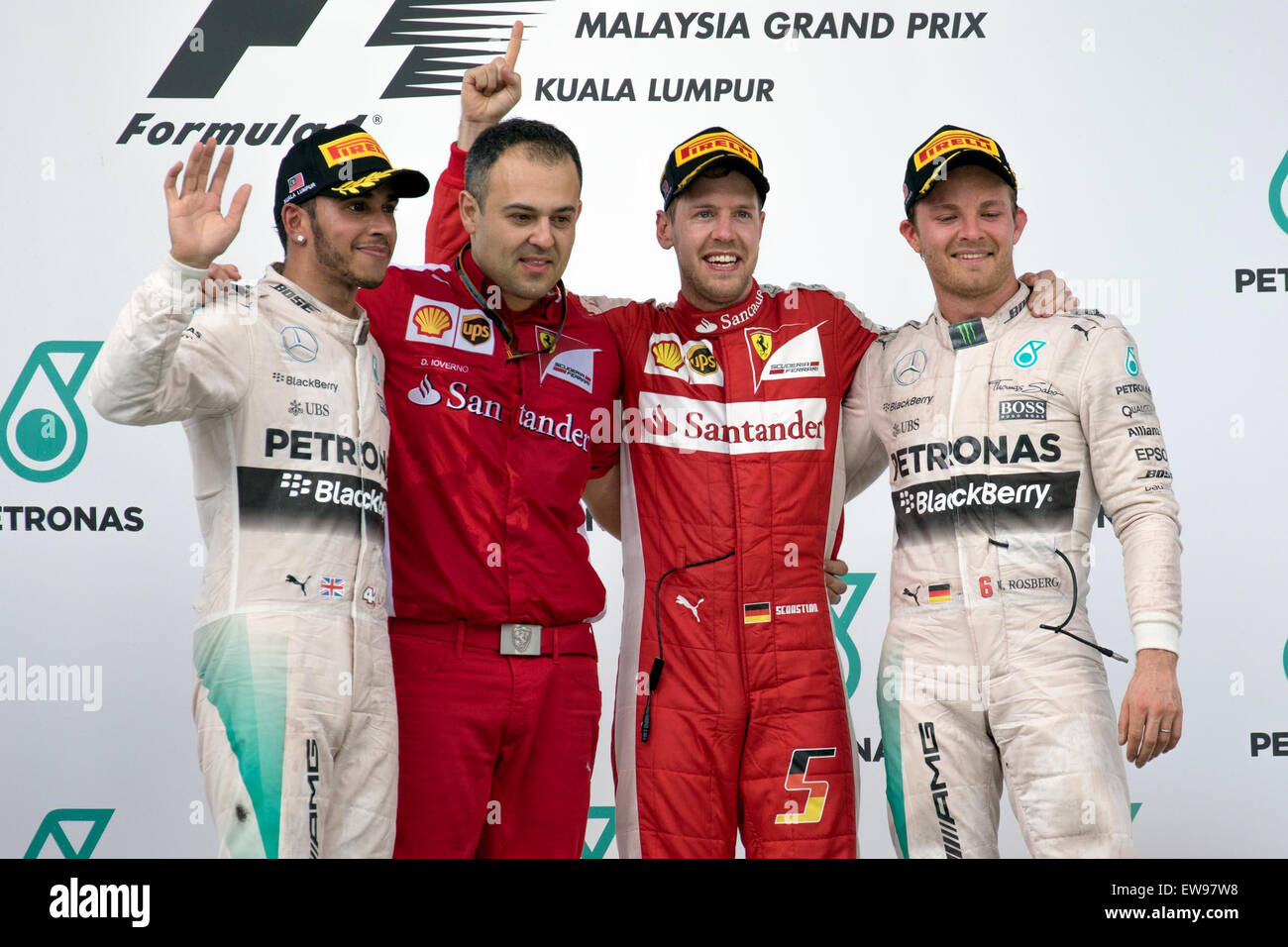 The podium celebrations at the 2015 Malaysian Grand Prix with Vettel and Hamilton sharing smiles