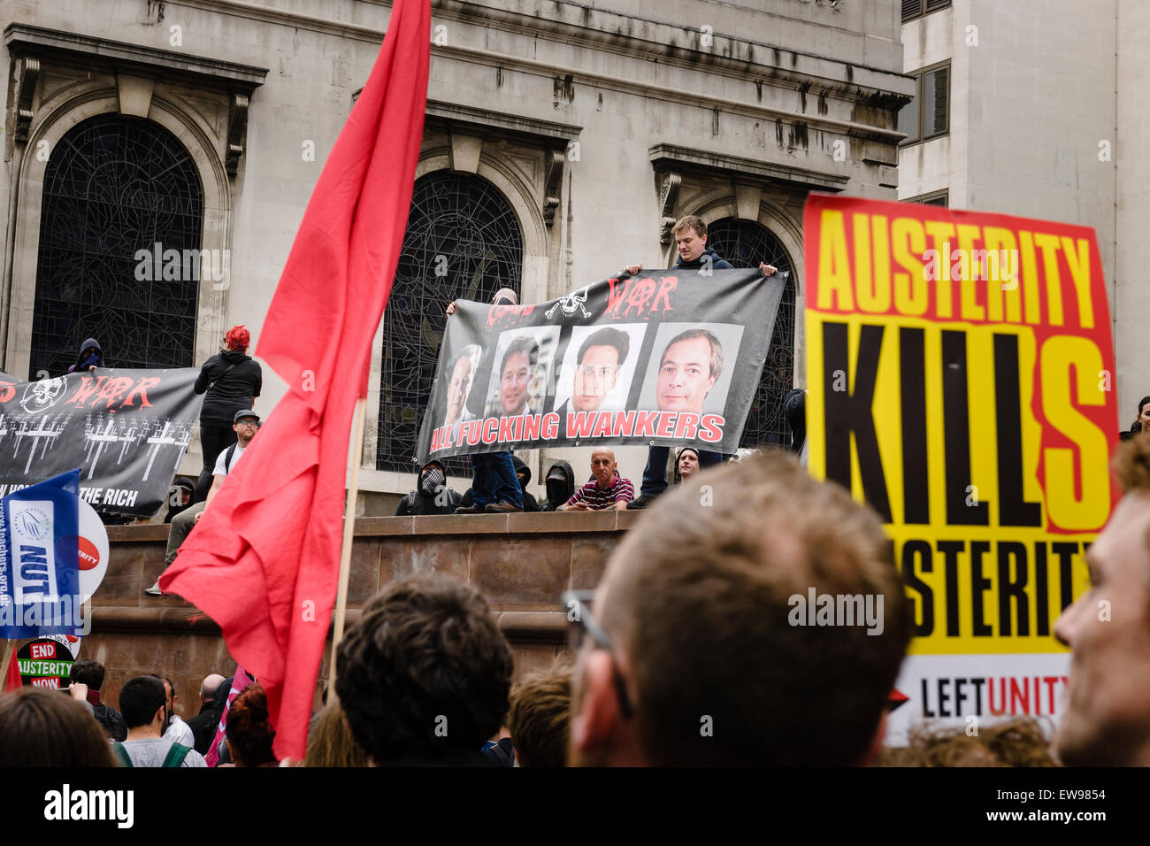 London, UK. 20th June, 2015. Masses of people marching through the streets of London on the 20th of June 2014 protesting against the Tory government's austerity politics and measures. Credit:  Tom Arne Hanslien/Alamy Live News Stock Photo