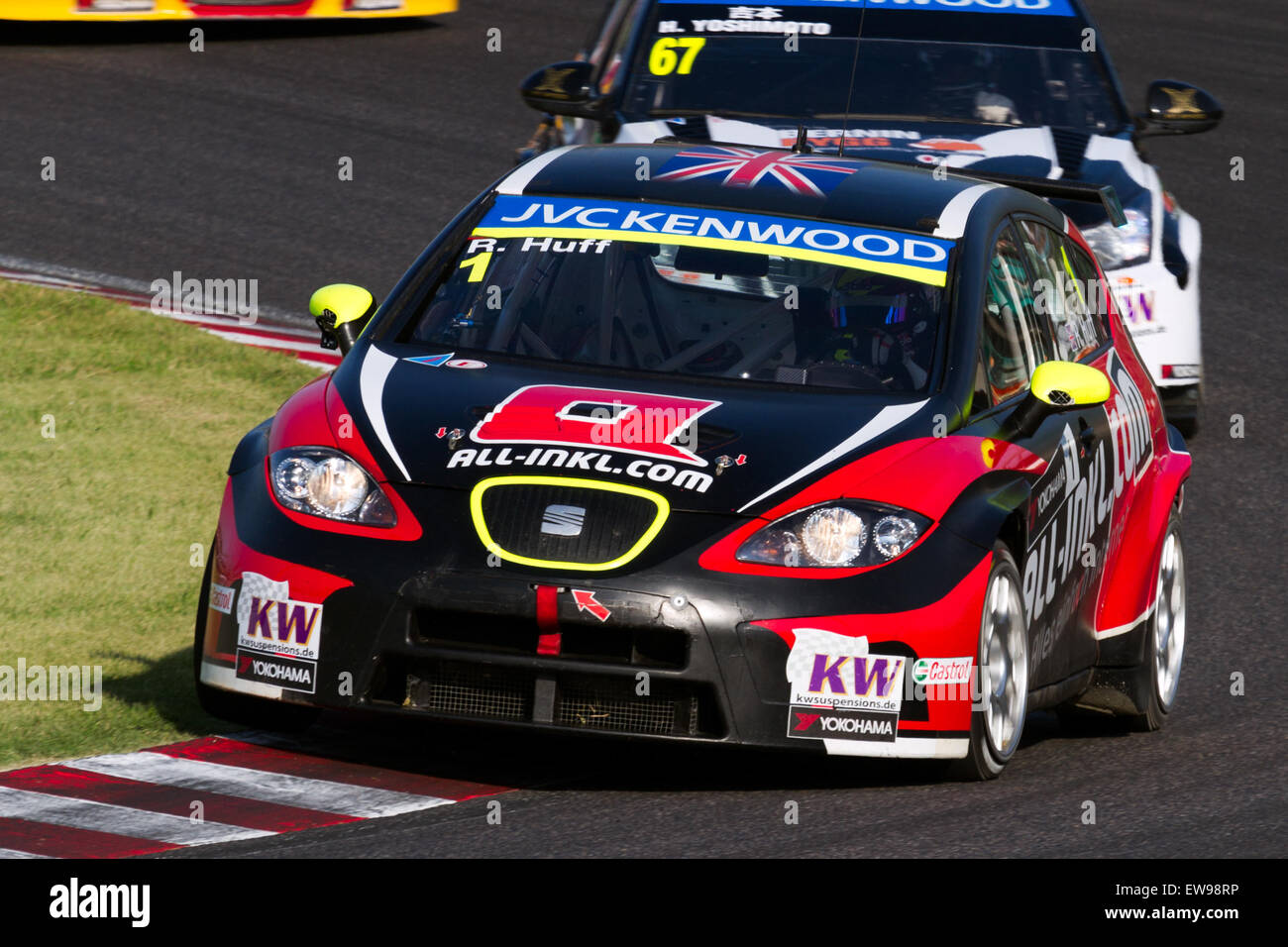 This image captures Robert Huff during the 2013 WTCC Race of Japan, showcasing the intense action of the qualifying round. The event highlights the speed and skill involved in international motorsport. Stock Photo