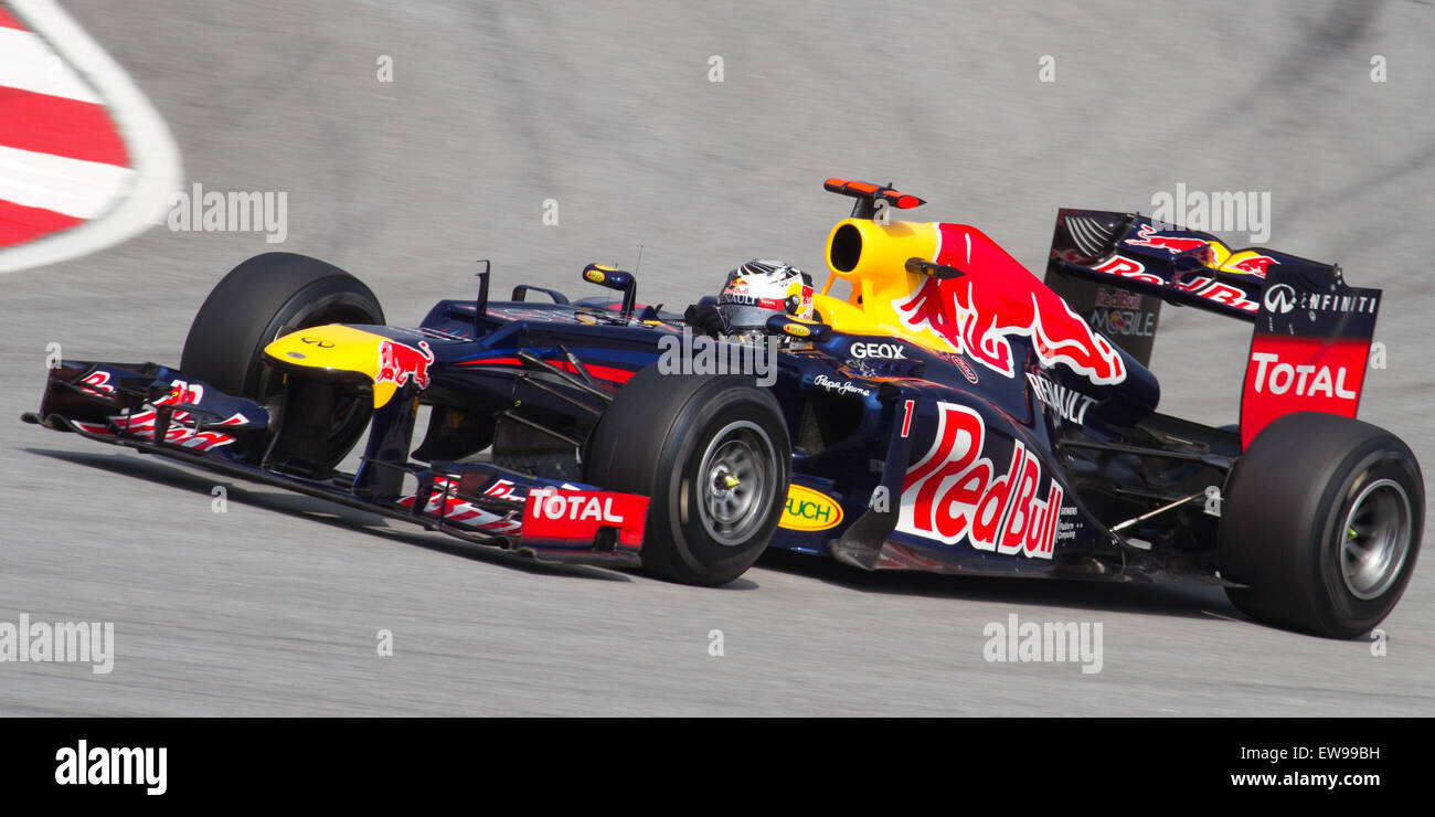 Sebastian Vettel qualifies for the 2012 Malaysian Grand Prix, showcasing his driving skills and competitive edge in Formula 1. This moment highlights his performance during the qualifying round of the race. Stock Photo