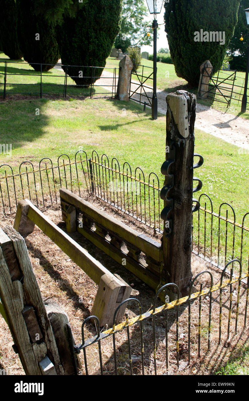 Stocks and whipping post, Forthampton, Gloucestershire, England, UK Stock Photo