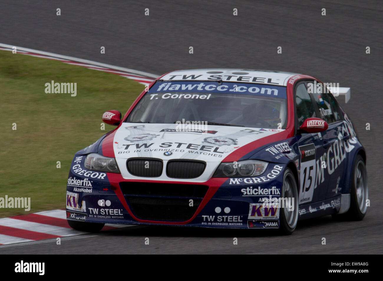 Photograph of Tom Coronel's car during the qualifying round of the 2011 World Touring Car Championship Race of Japan. The image showcases the car's front view on the track. Stock Photo